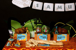Prehistoric_dinosaur_birthday_party_dessert_table_left_medium