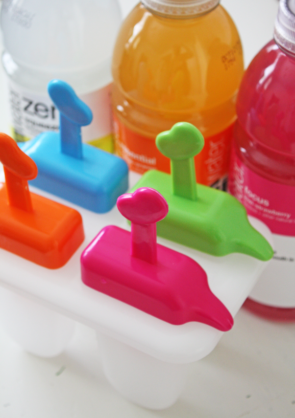 Making Vitamin Water Rainbow Popsicles | CatchMyParty.com