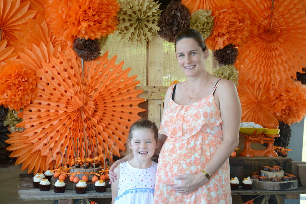 An earthy, rustic baby shower with a pop of tangerine Baby Shower Party