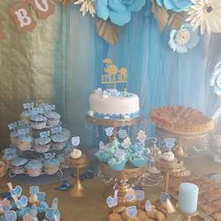 "A quick set up baby shower to suprise a new mom" - Gold ,Turquois,Teffany.